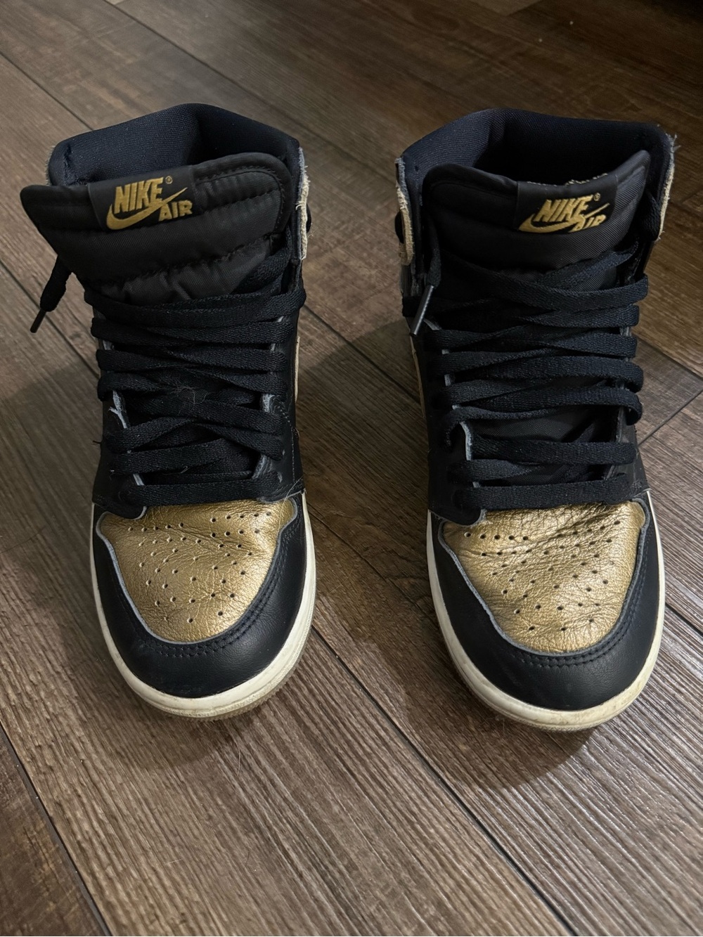 Nike High-Top Sneakers in Black and Gold